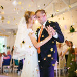 gorgeous stylish happy bride and groom performing their emotiona