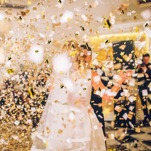 beautiful caucasian couple just married and dancing their first
