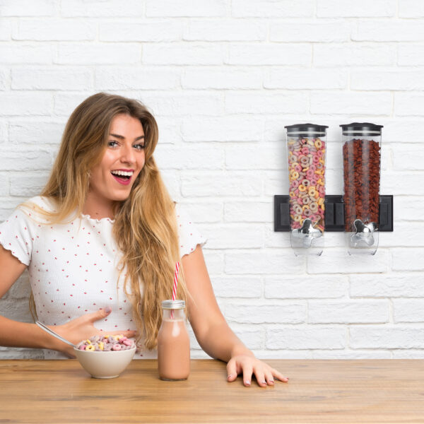 Young blonde woman with bowl of cereals
