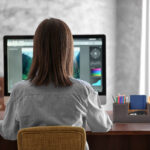 Woman working on computer at home