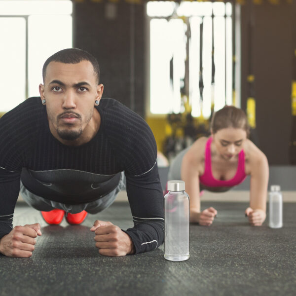 Fitness group plank training indoors