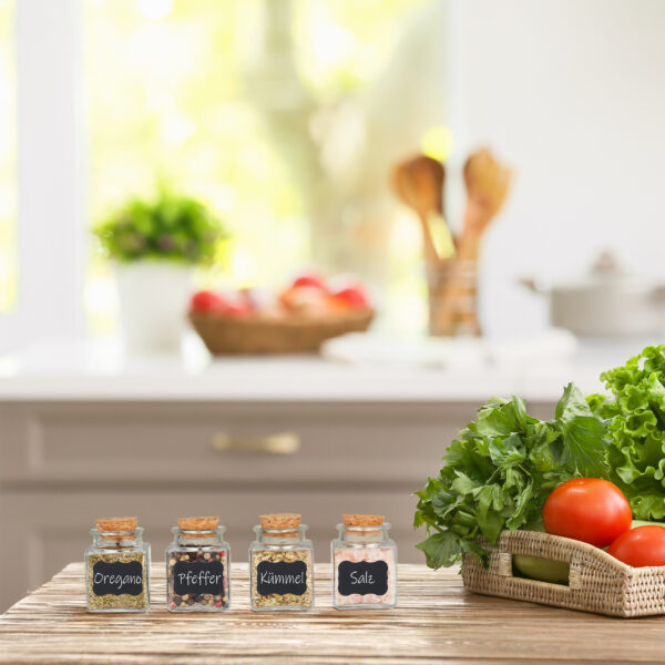 Tray with vegetables on table in modern kitchen