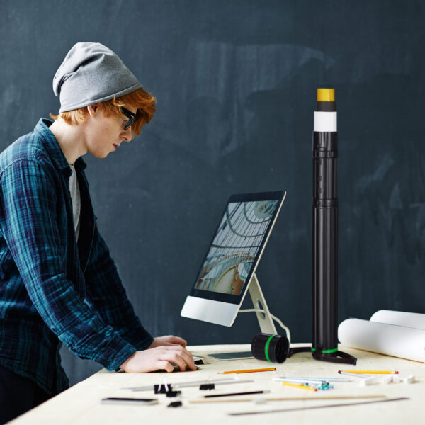 Contemporary Young Engineer at Workplace