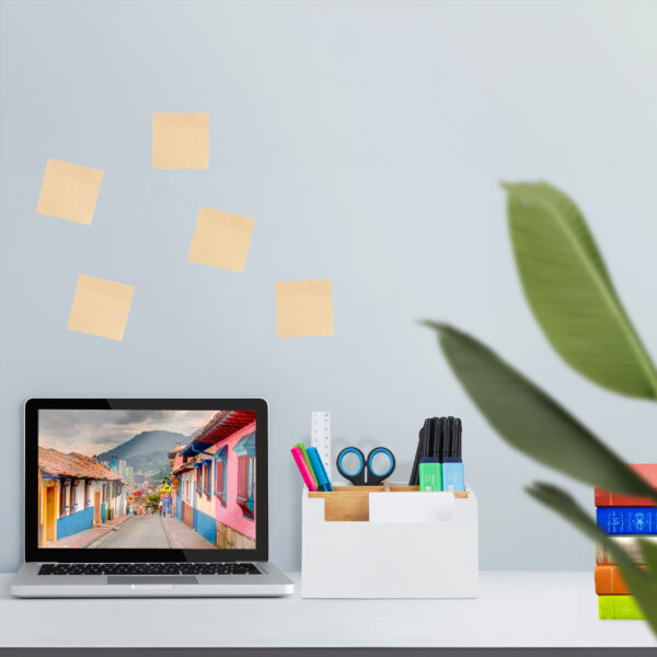 Laptop macbook screen on a bright blue background office workspa