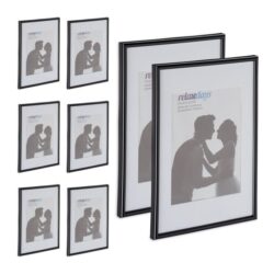 Rinkinys iš 8 nuotraukų rėmelių 30,5x22x1,5cm., juodos spalvos